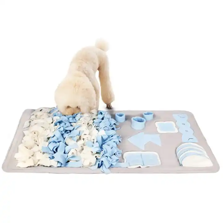 dog sniffs blue snuffle mat